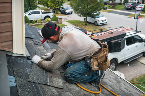 Professional Roofing technician working in Easton, CA